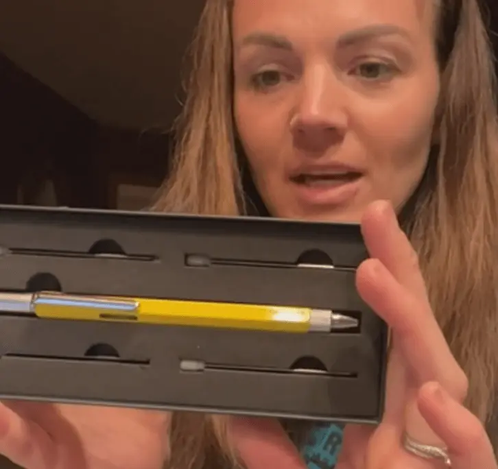 lady opens Apex Pencil case